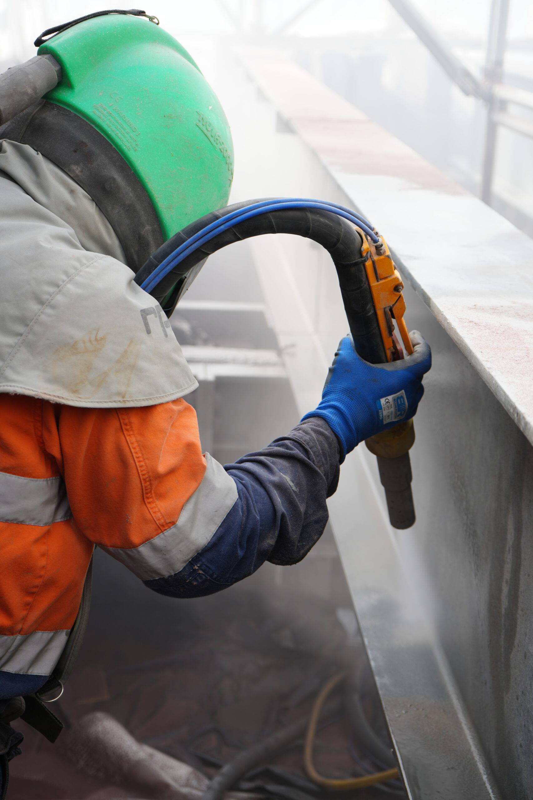 Technicians performing concrete remediation on bridge pier at Fremantle Ports