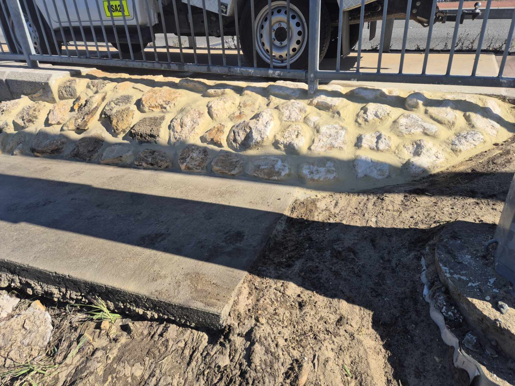Concrete crack remediation and surface preparation on bridge structure